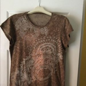 Calvin Klein Jeans short tee top in Large with brown,orange&cream design colors.